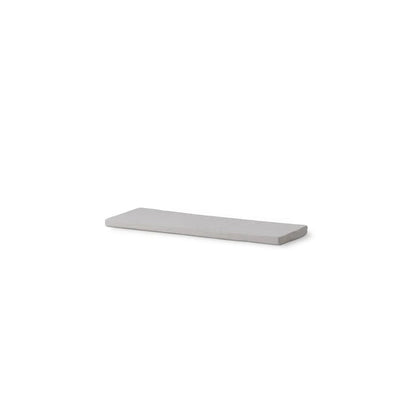 Rectangular light gray shelf on a white background