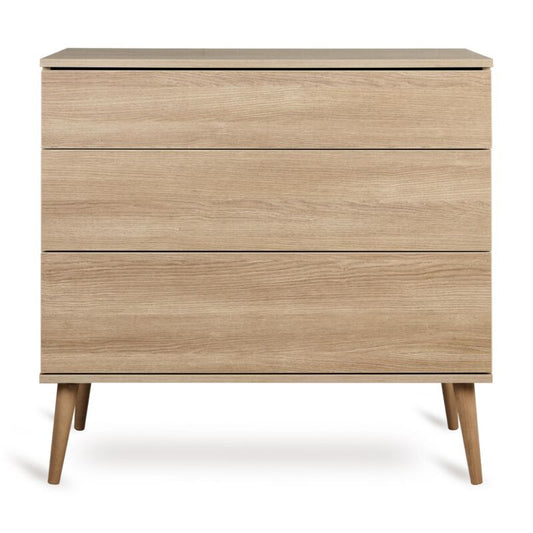 Quax Flow Chest in Honey Ash — front view with push-open drawers	