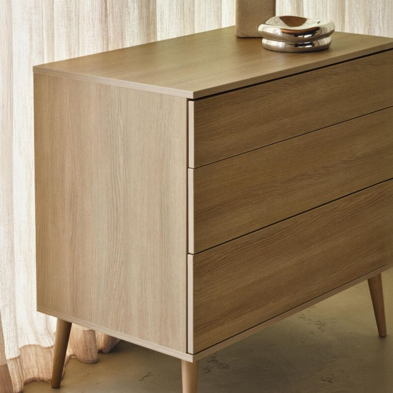 Quax Flow Chest in Honey Ash — angled view showing drawer detail	