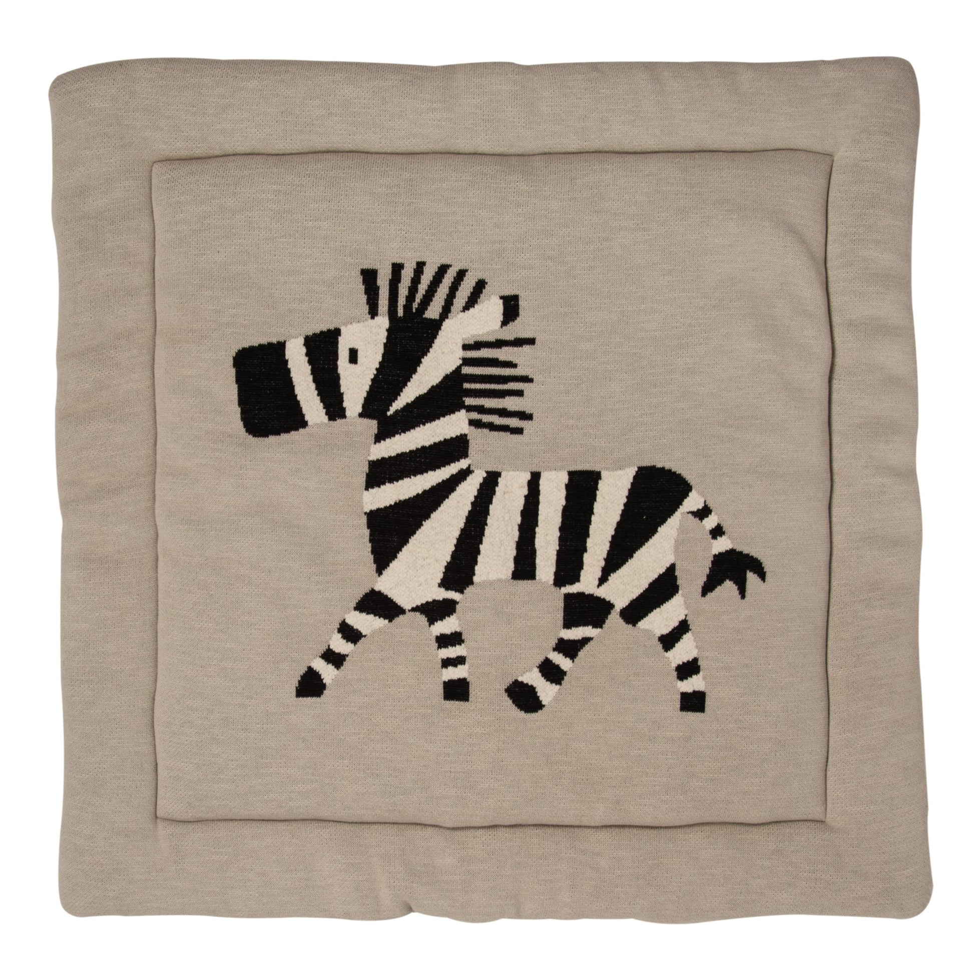 Beige play mat  with a black and white Lion design on a beige background