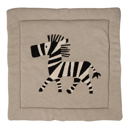 Beige play mat  with a black and white Lion design on a beige background