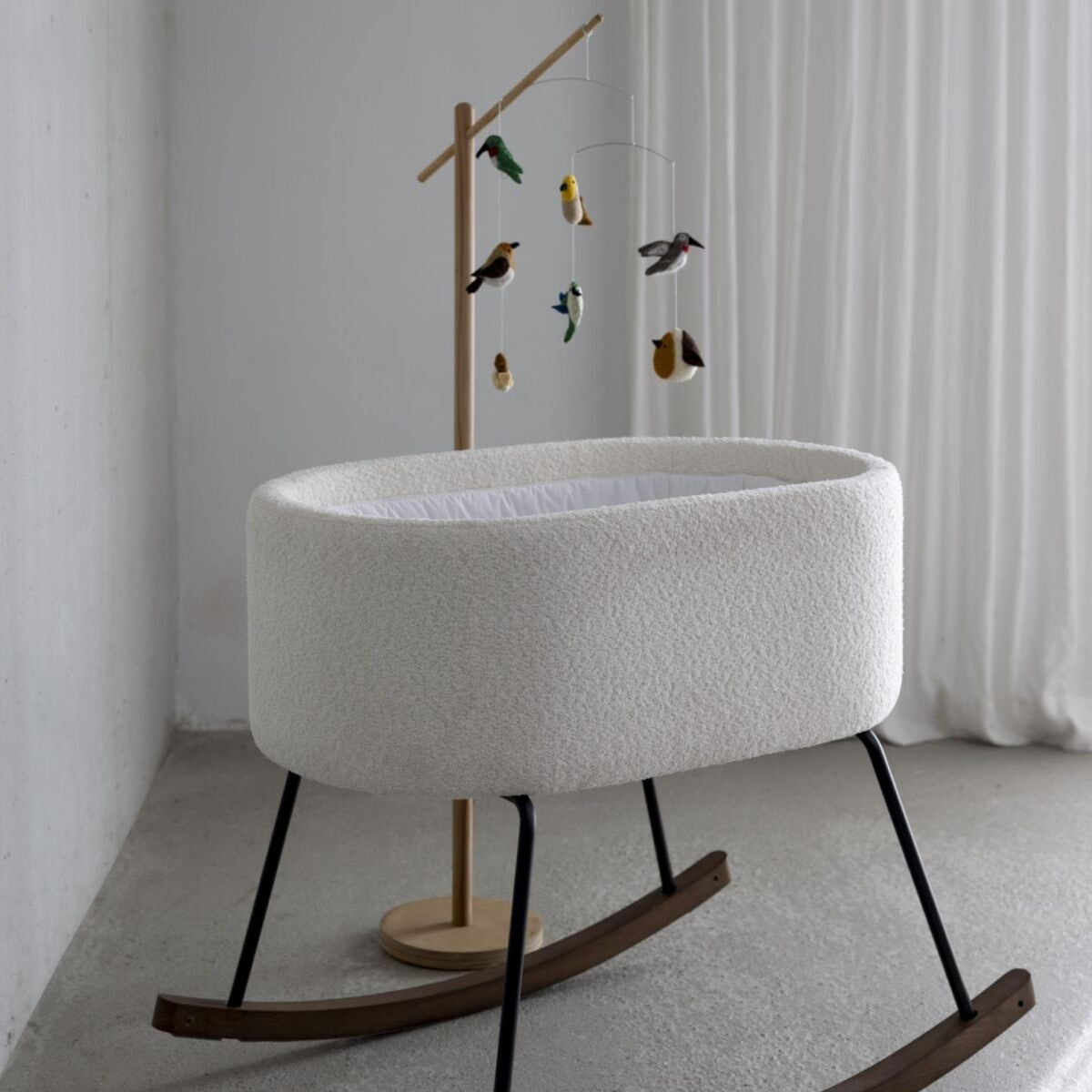 Cream Boucle Rocking Cradle with mobile