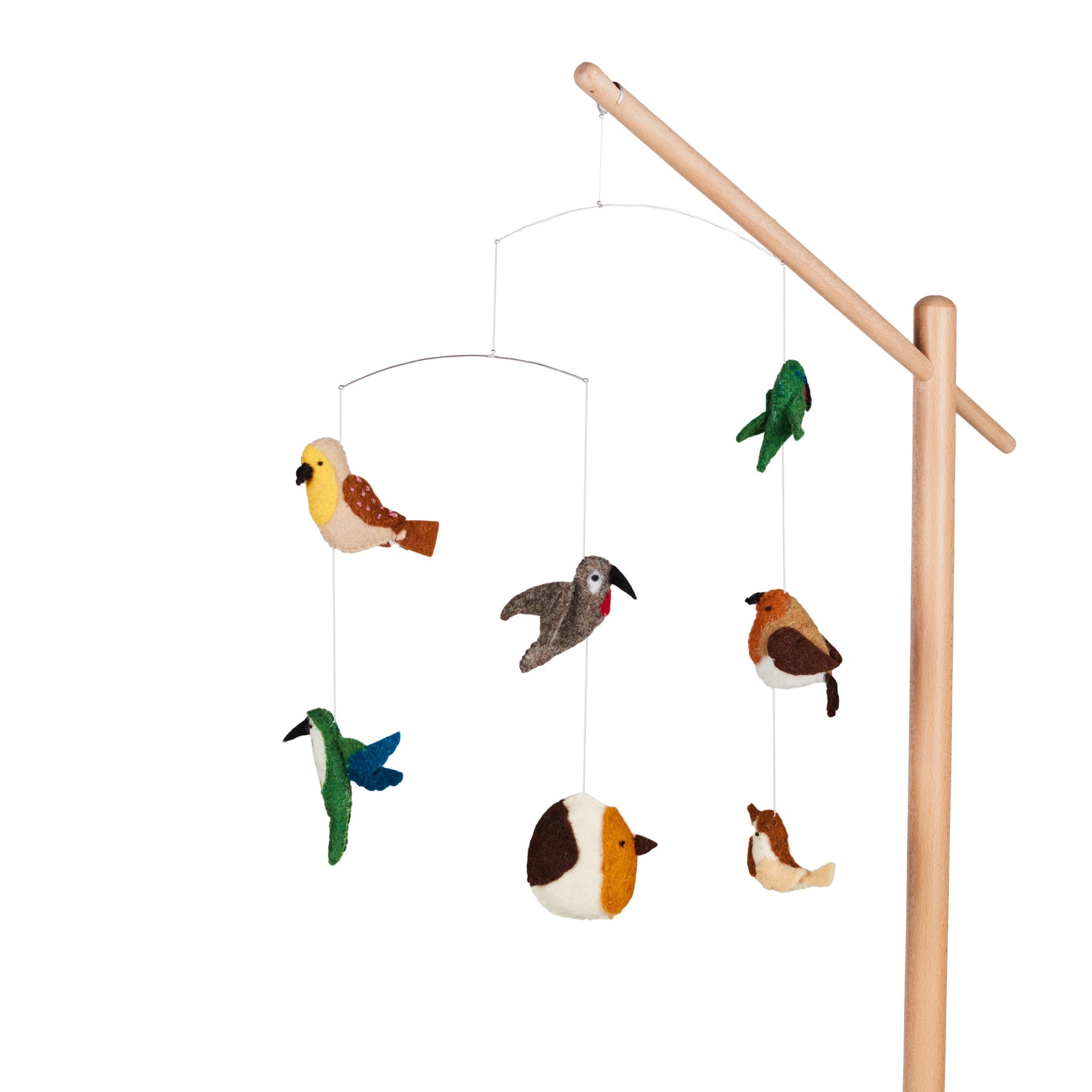 Bird-shaped mobile hanging from a wooden stand on a white background