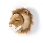 Stuffed lion head mounted on a white wall