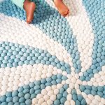 Close-up of blue and white pebbles on a white background