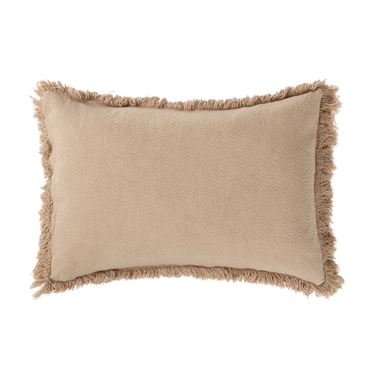 Beige pillow with frayed edges on a white background